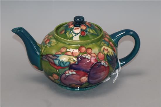 A Moorcroft Finches teapot and cover